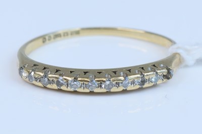 Lot 341 - A 9ct gold diamond set half eternity ring,...