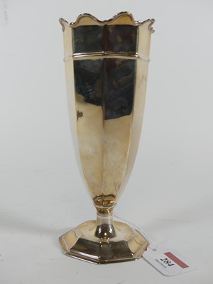 Lot 284 - A George V silver spill vase of fluted...