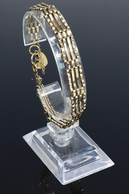 Lot 368 - A modern 9ct gold gatelink bracelet, with...