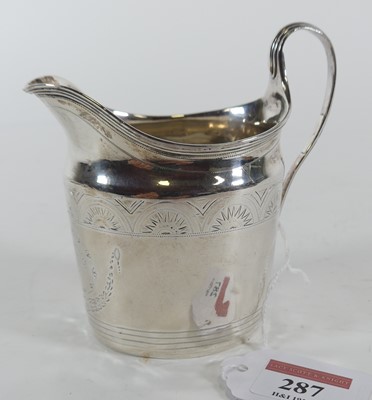 Lot 287 - A George III silver cream jug of helmet shape...