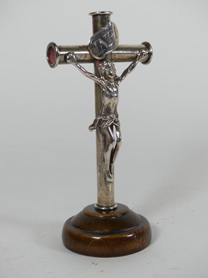 Lot 288 - A white metal model of Jesus Christ upon the...