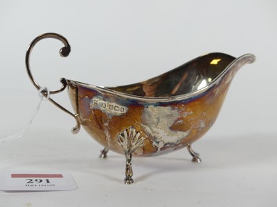 Lot 291 - A late Victorian silver sauceboat of plain...