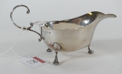 Lot 292 - A George V silver sauceboat of undecorated...
