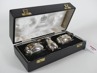Lot 300 - A modern silver three piece cruet to include a...
