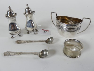 Lot 309 - A pair of Victorian silver preserve spoons in...