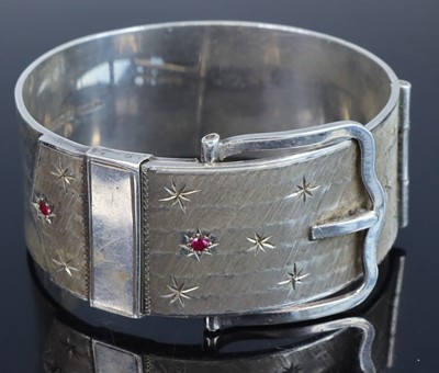Lot 391 - A Victorian style silver hinged bangle, having...