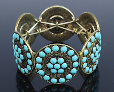 Lot 404 - A gilt metal turquoise set expanding bracelet