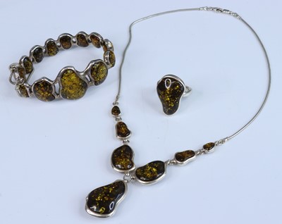 Lot 413 - A modern silver necklace set with green Baltic...
