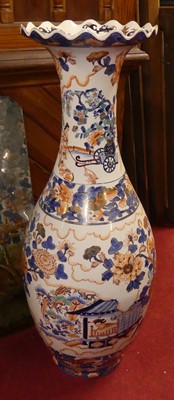 Lot 1208 - A large glazed ceramic floor standing baluster...