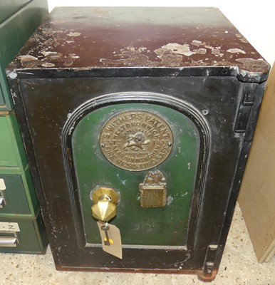 Lot 1233 - An early 20th century cast iron floor safe by...