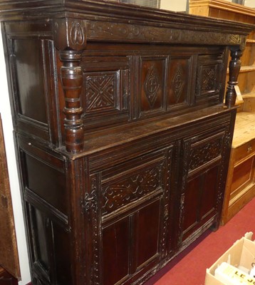 Lot 1241 - An antique joined, panelled and relief carved...