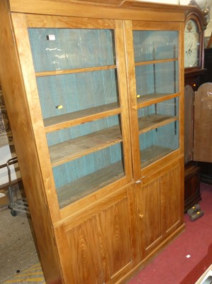 Lot 1243 - A joined chestnut freestanding bookcase,...
