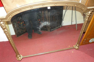 Lot 1267 - A Victorian gilt wood arched over mantel...