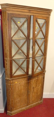 Lot 1276 - A rustic pine freestanding corner cupboard,...