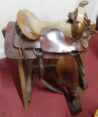 Lot 1278 - A collection of stitched and tooled leather...