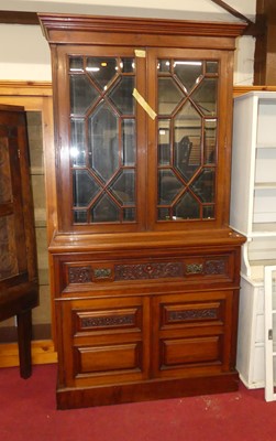 Lot 1283 - A late Victorian walnut secretaire bookcase,...