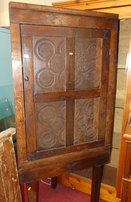 Lot 1284 - A rustic line carved and joined oak corner...