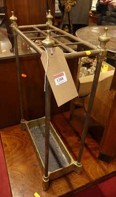 Lot 1288 - A turned brass eight division stickstand,...