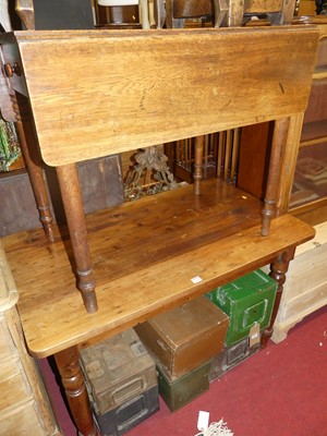 Lot 1300 - A stained pine round cornered compact...