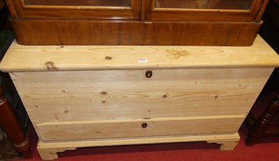Lot 1304 - A stripped pine hinge top mule chest, with...