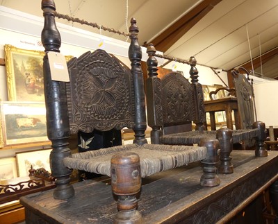 Lot 1321 - A matched pair of early 20th Century relief...