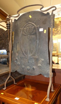 Lot 1323 - An Art Nouveau copper and iron fire screen, 75...