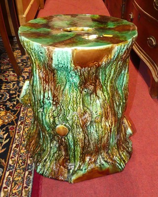 Lot 1328 - A majolica style glazed pottery garden seat,...