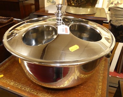 Lot 1331 - A polished metal four division champagne...