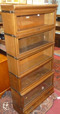 Lot 1336 - A 1930s Globe Wernicke oak and metal bound...