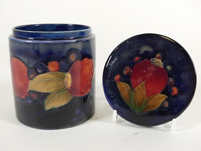 Lot 242 - A Moorcroft Pottery 'Pomegranate' pattern box...