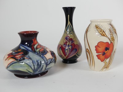 Lot 248 - A Moorcroft pottery 'Red Tulip' pattern vase,...