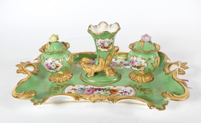 Lot 249 - A 19th century porcelain inkstand, with twin...