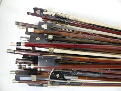 Lot 578 - A large collection of violin bows, various makers