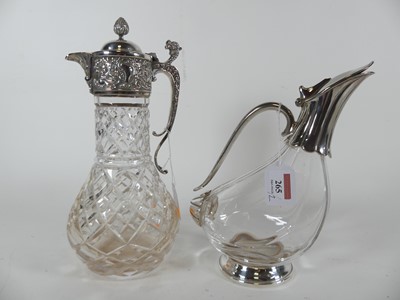 Lot 265 - A silver plated mounted cut glass claret jug,...