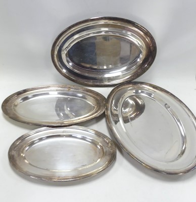 Lot 280 - A graduated set of four silver plated serving...