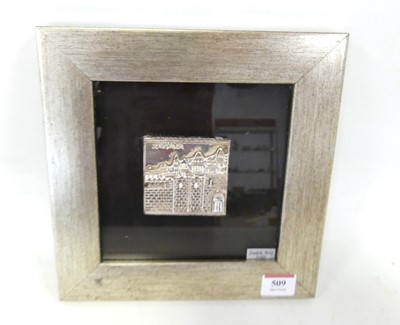 Lot 509 - A relief decorated white metal clad ingot,...