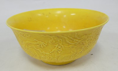 Lot 513 - A Chinese yellow glazed porcelain footed bowl,...