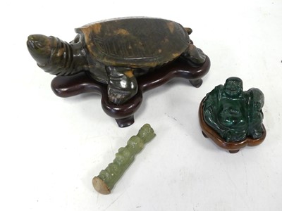 Lot 516 - A contemporary Chinese carved stone figure of...