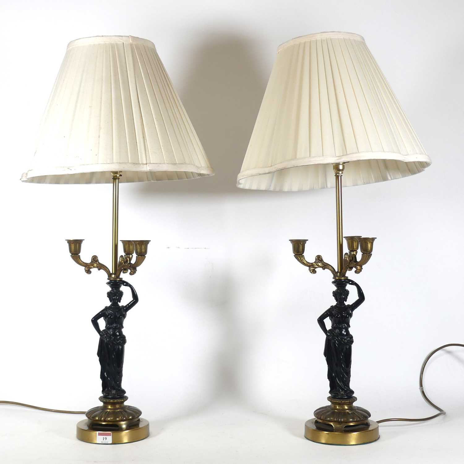 Lot 19 - A pair of contemporary figural metal table...
