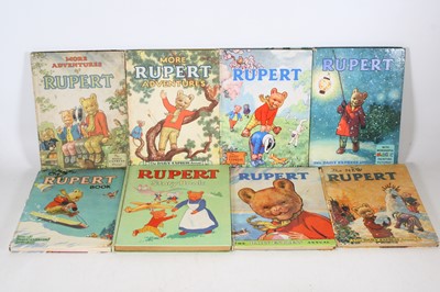 Lot 671 - Collection of 8 Rupert the Bear Annuals, to...