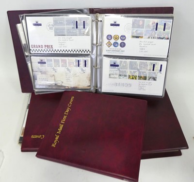 Lot 553 - Four albums of Royal Mail first day covers to...