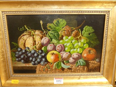 Lot 1052 - 20th century school - Still life with fruit on...