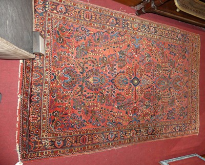Lot 1251 - A Persian woollen red ground Tabriz rug, 200 x...