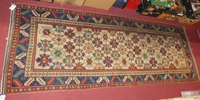 Lot 1253 - A Caucasian pale red, blue and green ground...