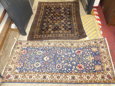 Lot 1259 - A Persian woollen blue & cream ground Tabriz...