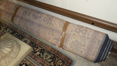 Lot 1261 - A blue, red and cream ground machine woven...