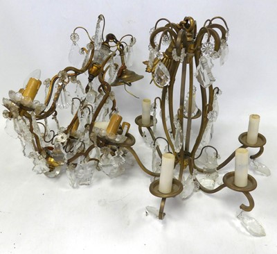 Lot 631 - A pair of brass and moulded glass five-branch...