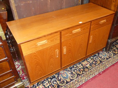 Lot 1348 - A 1970s G-Plan "Fresco" teak side cupboard,...