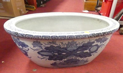 Lot 640 - A Chinese style stoneware planter, of oval...