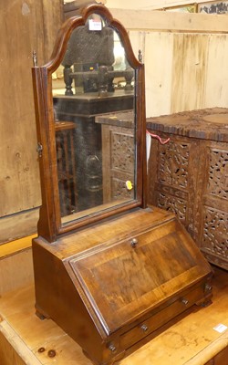 Lot 1353 - A figured walnut and crossbanded swing...